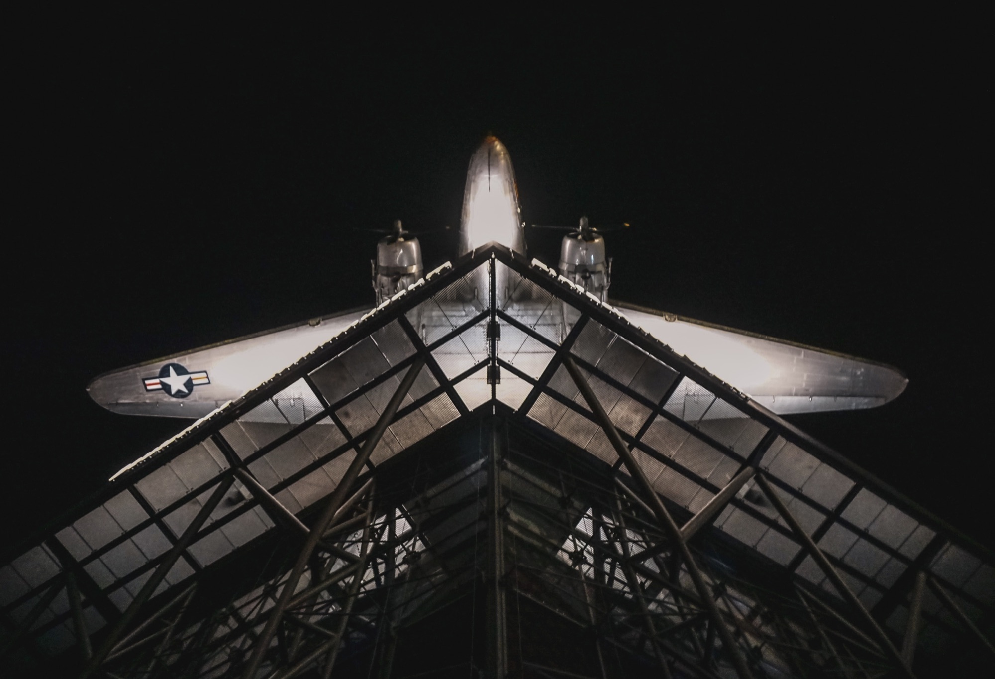 Aeroplane above a steel roof structure