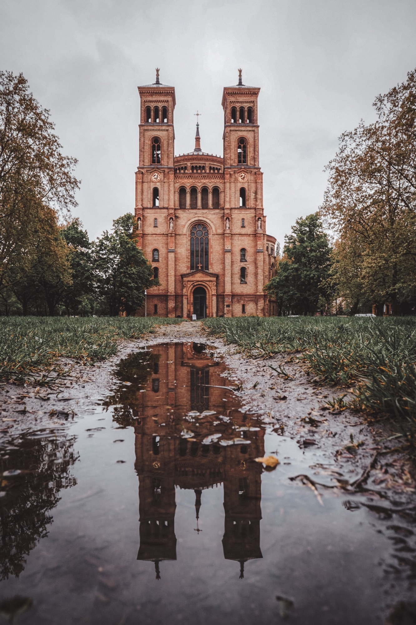 Church reflected in a puddle