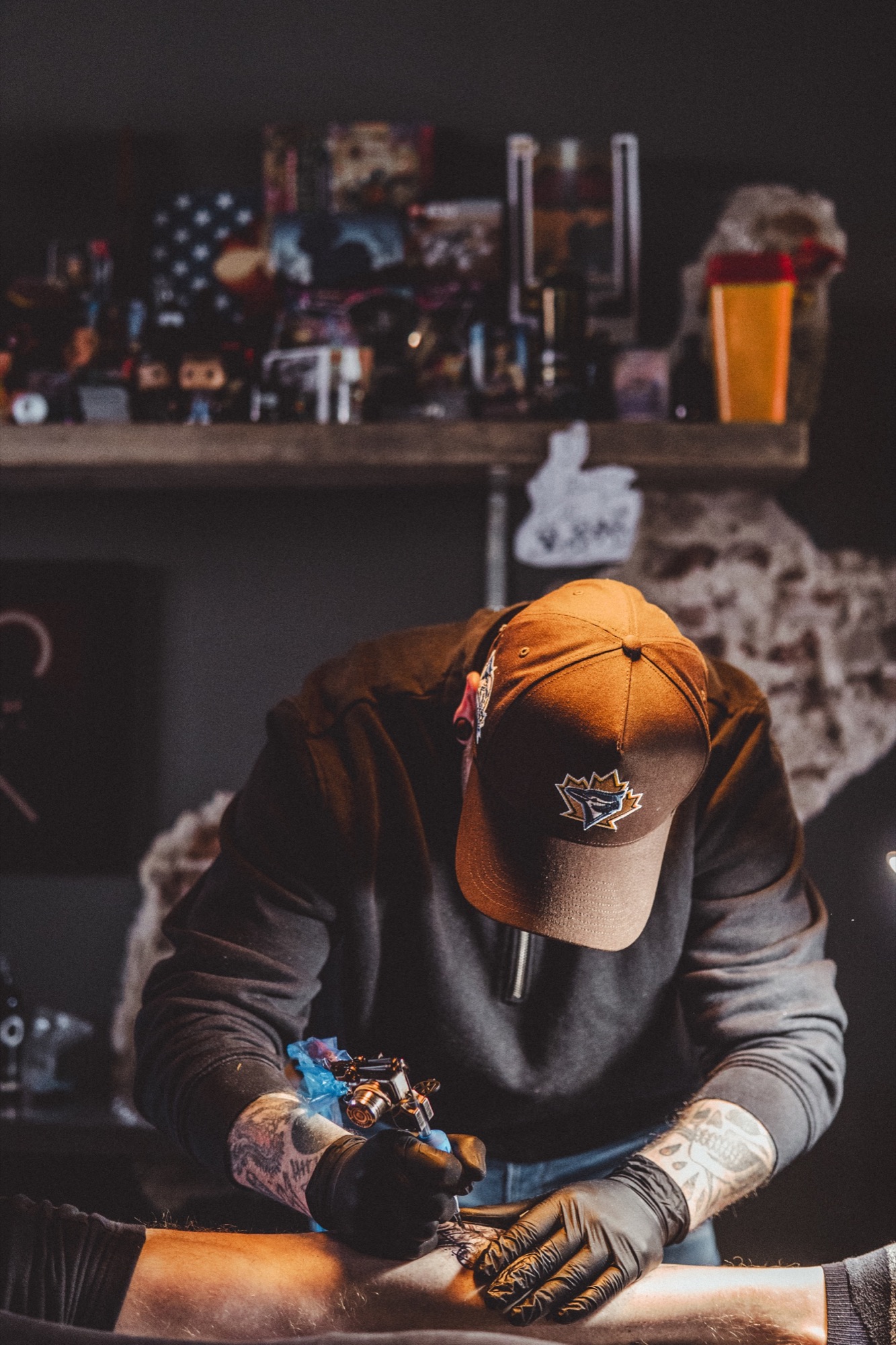 Tattoo artist at work in his studio
